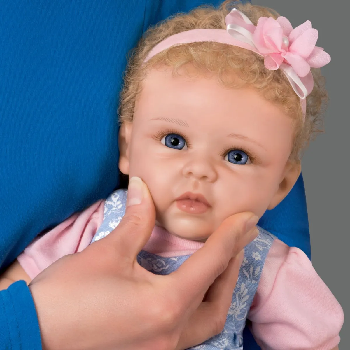 The Ashton - Drake Galleries Little Livie Lifelike Silicone Baby Girl Doll TrueTouch® Authentic Silicone Weighted for Realism Hand-painted & Hand-rooted Hair Baby Doll by Linda Murray 19-inches